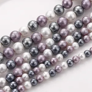 Close-up of mixed color baroque cotton pearls with textured surface for DIY jewelry