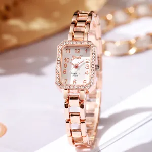 Elegante reloj de cuarzo rectangular en oro rosa para mujer con bisel de diamantes de imitación