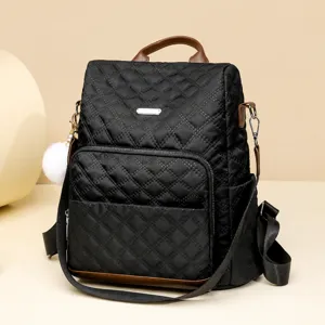 Femmes Casual Nylon Sac à Dos Grande Capacité Matelassé Voyage Daypack Mode École Bookbag avec Mignon Pendentif Pom Pom