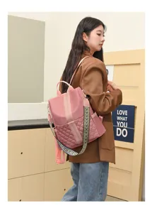 Stylish pink nylon quilted women backpack with wide stylish straps for casual daily use.