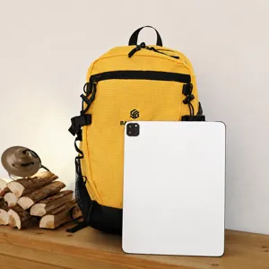 Sac à dos de randonnée jaune à carreaux grande capacité pour sport en plein air voyage.