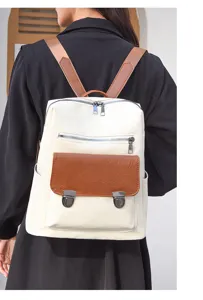 Detailansicht des Retro PU Leder Damen Rucksacks mit Fronttasche und Metallschnalle.