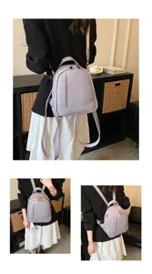 Sac à dos femme en cuir souple en détail, élégant sac de voyage tendance en violet.