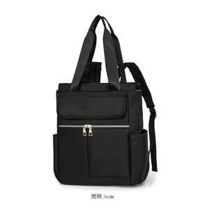 Vue détaillée du sac à dos convertible noir avec poche avant et tissu en nylon résistant.