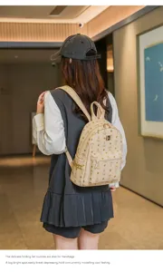 Sac à dos femme style préppy cuir PU monogramme ours impression voyage loisir chic.