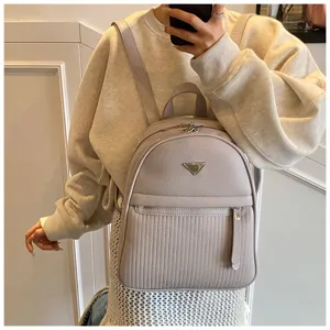 Stylish women PU leather backpack, casual daily travel bookbag with front pocket and straps.