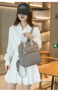 Detailed view of women casual quilted backpack with metal studs, elegant taupe daypack.