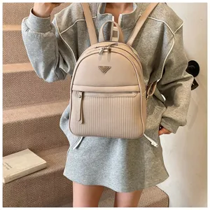 Stylish minimalist lightweight PU leather women backpack for daily commute and travel use.