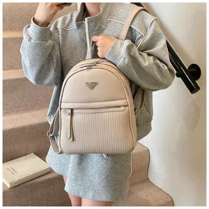 Detailed view of the stylish faux leather backpack for women, perfect for daily commute and travel.