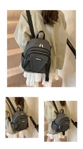 Koreanischer Pendler-Rucksack aus dunkelgrauem, strukturiertem Leder, vielseitiger Tagesrucksack.