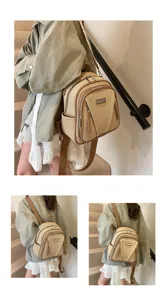 Detailansicht des geflochtenen Rucksacks mit Lederbesatz, praktischen Taschen und Schultergurten.
