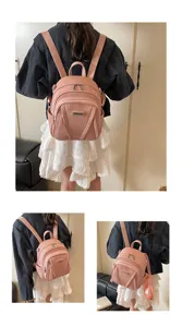 Koreanischer Stil Pendler rosa Rucksack texturiertes Mode Nischen Design vielseitige Tasche.