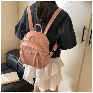 Schicker rosa koreanischer Pendler-Rucksack mit praktischem Mehrfachtaschen-Design.