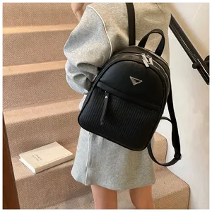 Stylish black PU leather backpack for women, casual daily commuter travel daypack.