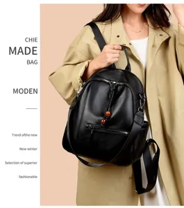 Stylish black PU leather backpack for women, large capacity casual daypack for autumn and winter.