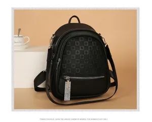 Black women backpack detail, PU leather texture, rhinestone zipper charm, travel casual.