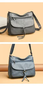 Soft leather shoulder bag detail showing multi-zipper pockets, front flap, and adjustable strap.