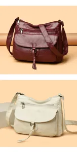 Details of women soft leather crossbody shoulder bag showing zippers and flap pocket.