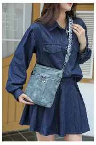 Retro canvas crossbody bag with multi pockets and patterned strap for women daily wear detail.