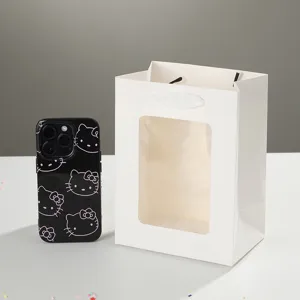 Sacchetto regalo in carta bianca con finestra trasparente, ideale per bouquet e confezioni.