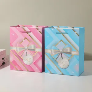 Decorative paper gift bags with ribbons and handles, colorful party candy packaging details.