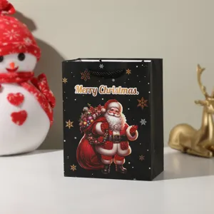 Schwarze Weihnachtstüte mit Weihnachtsmann-Grafik und festlicher Aufschrift für Geschenke.