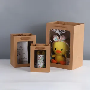 Kraftpapier cadeautjes tassen met doorzichtig venster, ideaal voor bloemen en verpakking.