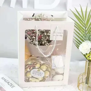 White window gift bag for flowers, elegant paper handbag for romantic couple gifts.