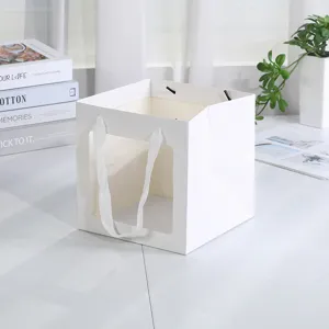 Bolsa de regalo blanca con ventana transparente caja de papel cuadrada para fiestas y pasteles.