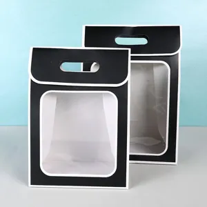 Black and white transparent window gift bag, ideal for dolls, flowers and party favors.