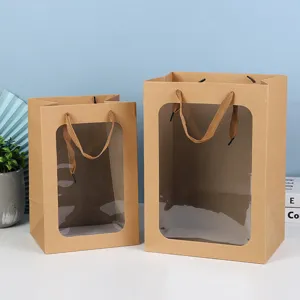 Kraftpapier cadeautas met doorzichtig venster, mooie verpakking voor bloemen en cadeaus.