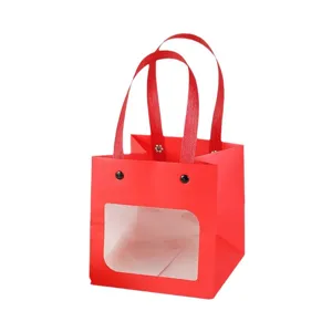 Red paper gift bag with transparent window, cute tote bag for cakes, flowers, and presents.