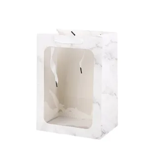 Marmer patroon papier geschenktas met doorzichtig venster voor bloemenverpakking en feestjes.
