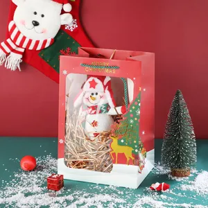 Christmas gift bag with transparent window, paper packaging for holiday presents and decor