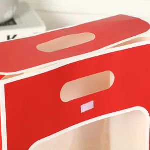 Borsa regalo rossa per fiori con finestra trasparente e manico, ideale per anniversari.