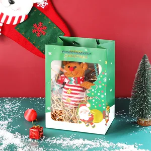 Christmas gift bag with clear window and festive design, perfect for holiday presents and packaging.