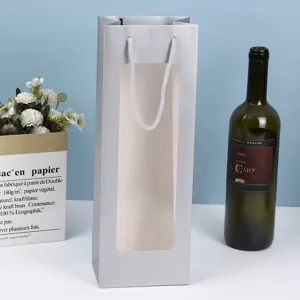 Borsa regalo in carta argentata con finestra trasparente, elegante sacchetto per fiori e vino.