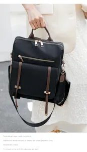 Vue détaillée du sac à dos noir pour femme avec lanières marron et fermetures éclair.