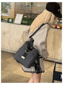 Detailed view of women's Oxford cloth backpack, casual fashion daypack with style.