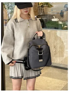 Stylish oxford cloth backpack for women, casual travel daypack with large capacity and lightweight design.