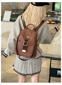 Stylish women's oxford cloth backpack, perfect casual travel daypack with large capacity.