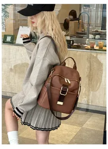 Detailed close-up of women fashion oxford cloth backpack, versatile casual travel daypack bag.