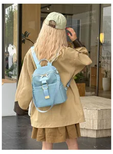 Light blue Oxford cloth backpack detail, stylish fashion casual travel small bag design