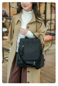 Elegante zaino da donna in pelle PU borsa casual multiuso alla moda con nappina.