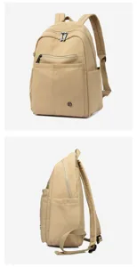Detailed view of the beige nylon casual backpack showcasing multiple compartments and zippers.