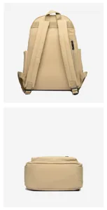 Detailed view of the khaki nylon backpack showing back straps and bottom structure.