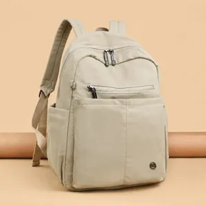 Casual nylon backpack for women, large capacity travel school bag, khaki daily use.