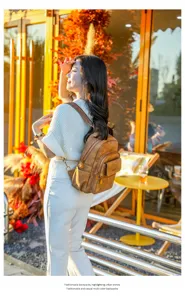 Stylish brown leather backpack for women, casual urban travel daypack with multiple pockets.