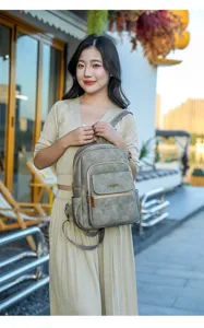 Casual women grey backpack street style detail shot commuting daily use travel bag fashion accessory