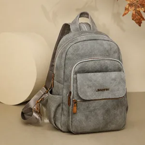Grey casual multi-use backpack for women, stylish commuting daypack with large travel capacity.